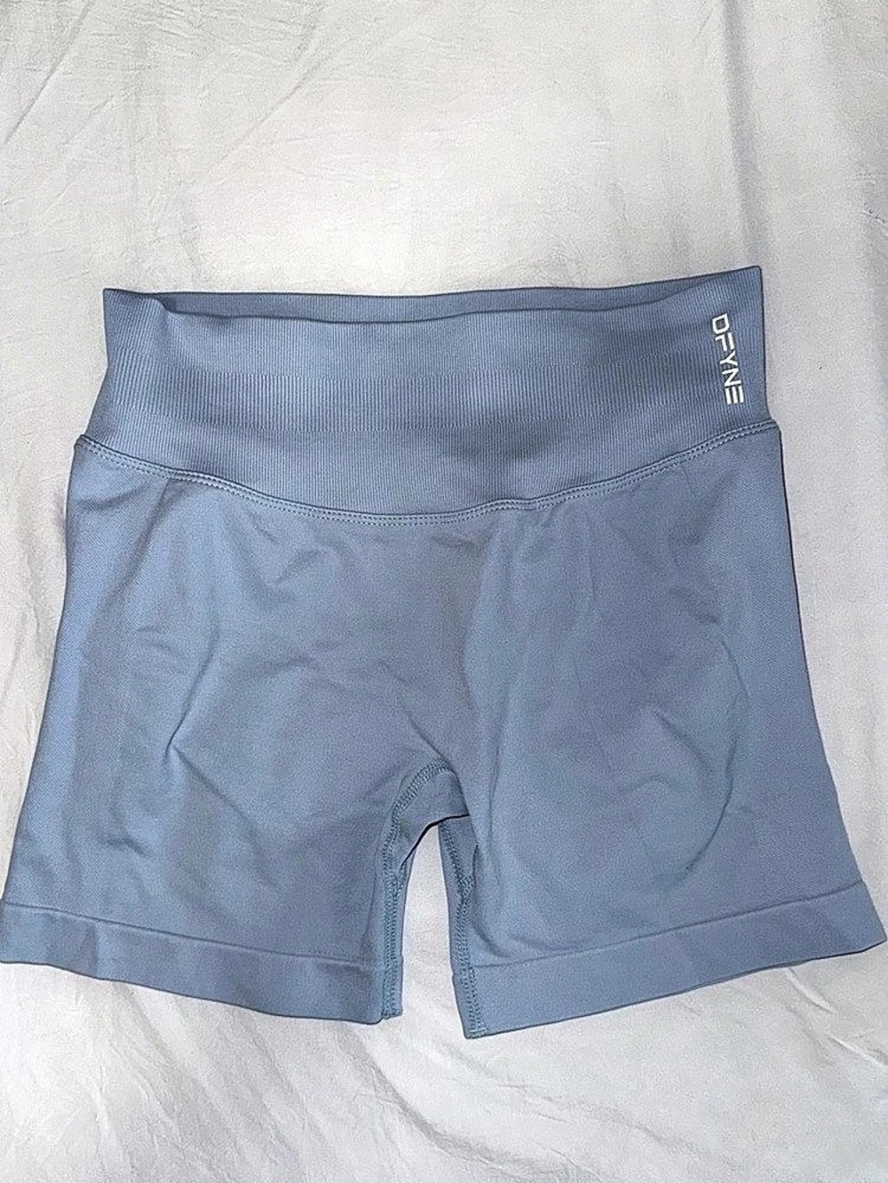 DFYNE women’s medium impact 4.5” shorts in Ice Blue